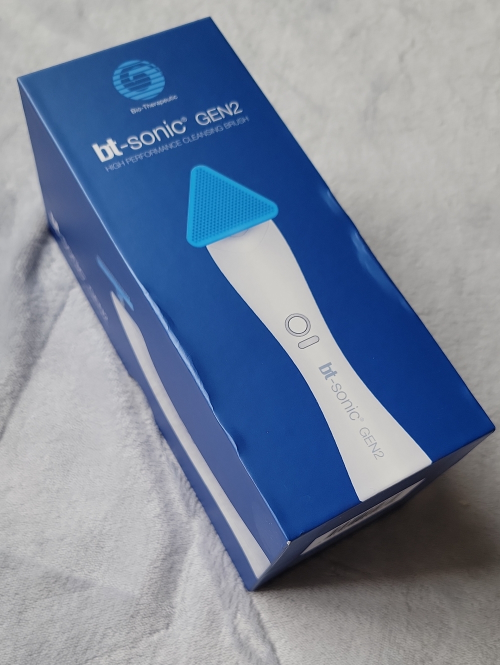 BT SONIC Cleansing Brush in Blue and White